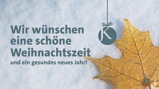 Goldenes Ahornblatt mit Weihnachtswunsch